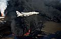 F-14A VF-114 over burning Kuwaiti oil well 1991