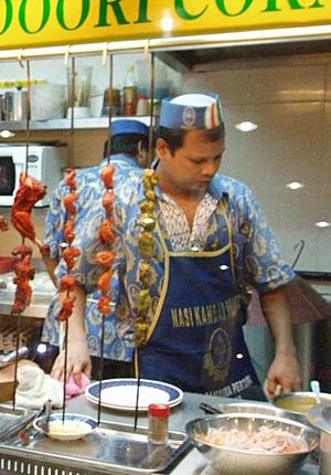 Malaysian mamak making tandoori chicken 2005