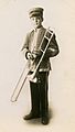 Newsboy Military Band Member with Trombone, Toledo, Ohio - DPLA - 6b52b39cf72038f9058254142eef1e79 (page 1) (cropped)