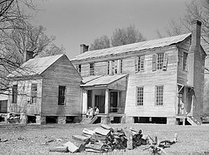 Rear view of the detached kitchen and former plantation home of the Mark Pettway family, called Sandyridge, in Boykin during April 1937. The house was demolished a short time later.  Photographed by Arthur Rothstein.