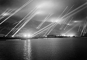 Searchlights pierce the night sky during an air-raid practice on Gibraltar, 20 November 1942. GM1852