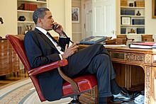 Barack Obama on the phone in the Oval Office with René Préval 2010-01-15