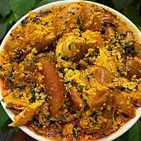 Egusi_soup_with_ponmo_and_beef