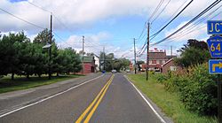 Looking north along Eayrestown Road approaching Red Lion Road in the center of Red Lion