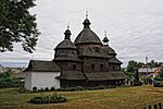 Wooden church with three domes