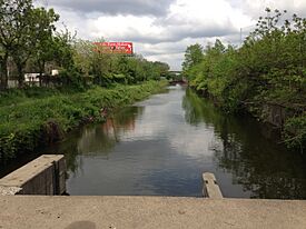 2014-05-15 15 18 32 View down the Delaware and Raritan Canal from where it emerges from beneath the Trenton Freeway (U.S. Route 1) at Mulberry Street in Trenton, New Jersey