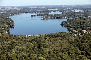 Aerial view of Geist Reservoir and surrounding housing developments in Indianapolis suburb of Fishers, Indiana