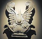A sculpture known as a "palmette antefix" displaying large leaf fronds