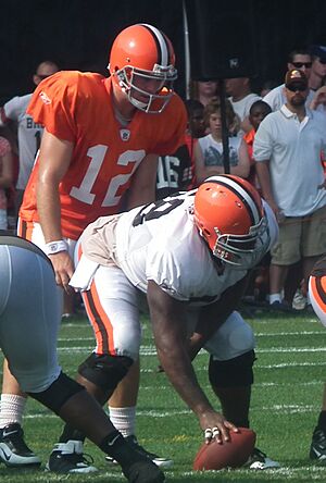 Colt McCoy taking snap