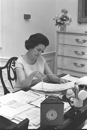 Lady Bird Johnson working in her office