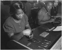 No original caption. Credit Vocational Schools, Baltimore. (African-American Woman working at what appears to be... - NARA - 516348