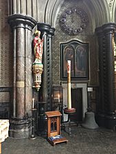 St Cuthbert statue paschal candle and clock listed building No. 266119