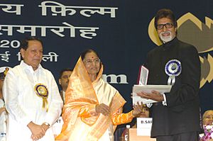 The President, Smt. Pratibha Devisingh Patil presenting the Best Film Actor Award for the year 2005 to Shri Amitabh Bachchan