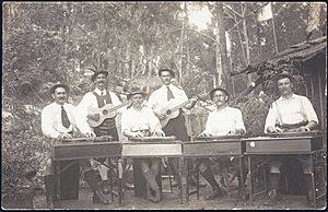 A group of German prisoners of war playing zithers and guitars in their national dress, Berrima Concentration Camp, New South Wales, ca. 1916 (16652710979).jpg