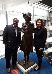 Amanda Matthews with Roland Martin at Newseum, Washington, DC for unveiling of Alice Dunnigan statue