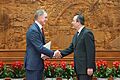 Ambassador Purdue shakes hands with Hong Lei, Assistant Foreign Minister of China's Ministry of Foreign Affairs
