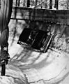 Henry Taylor driving a Ford Cortina down the bobsleigh run at Cortina d'Ampezzo