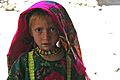 Pashai girl in Afghanistan, wearing distinctive Pashai clothing
