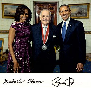 Robert Silvers with Barack and Michelle Obama