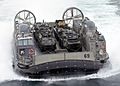 US Navy 030113-N-2972R-114 A Landing Craft Air Cushion (LCAC) Vehicle from Assault Craft Unit Four (ACU-4) transports Marine Assault Vehicles to Kearsarge