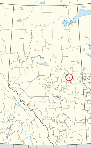 A map of the province of Alberta showing 80 counties and 145 small Indian reserves. One is highlighted with a red circle.