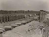 Flag draped coffins of American soldiers at a military funeral ceremony at the Madingley, England, (date unknown, but probably after 1943) - NARA - 6003746 (cropped)