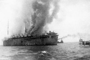 RMS Empress of Asia on fire after IJN air attack