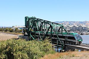 SMART train crossing Haystack Landing bridge