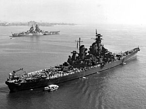 USS New Jersey (BB-62) and French battleship Richelieu at anchor on 7 September 1943 (80-G-204842)