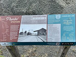 Hauraki Trail information board about Puriri railway station