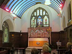 interior of church, showing altar and reredos