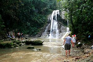 People at Gozalandia Falls in San Sebastián, Puerto Rico