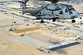 US Navy 110105-N-0318S-093 A U.S. Marine Corps CH-53 Sea Stallion helicopter flies over a Seabee project site in Camp Leatherneck, Afghanistan