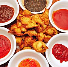 Crab rangoon with some nice dipping sauces (4411368535)