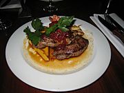 I have had it before, but at dinner tonight I could not resist playing the curious American to order a kangaroo steak and some prawns. It was rather tasty, but cannot say it is a huge come backer. (1605140084)