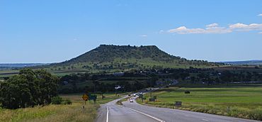 Looking west along the Warrego Highway in Charlton towards Gowrie Mountain, 2015.jpg
