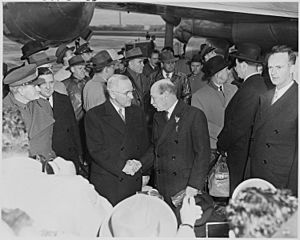 Photograph of President Truman shaking hands with British Prime Minister Clement Attlee at Washington National... - NARA - 200256