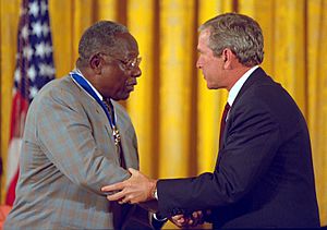 President George W. Bush presents the Presidential Medal of Freedom to Hank Aaron