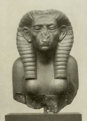 Partially defaced bust of a female