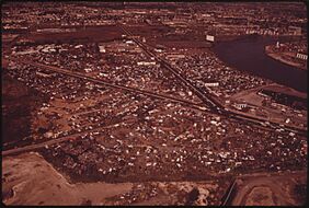 AUTO JUNKYARDS OFF NETWORK OF ROADS IN SOUTHWEST PHILADELPHIA - NARA - 552725