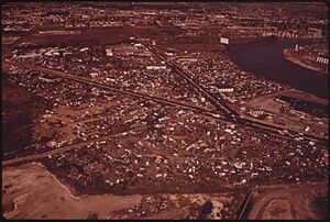 AUTO JUNKYARDS OFF NETWORK OF ROADS IN SOUTHWEST PHILADELPHIA - NARA - 552725