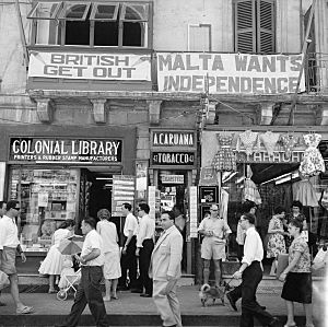 A view of shops with anti-British and pro-Independence signs, possibly on Kings Street, Valetta, Malta (5074435957)