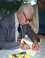 Carl Barks signing autographs in Finland in 1994