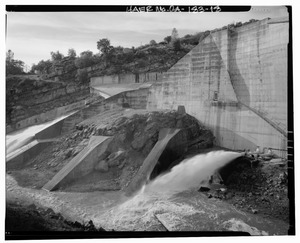 INTAKE PIPES ON THE RIGHT BUTTRESS USED TO SPILL WATER INTO THE SALINAS RIVER. CAMERA FACING NORTHEAST. - Salinas Dam, Salinas River near Pozo Road, Santa Margarita, San Luis HAER CAL,40-SANMAR.V,1-18
