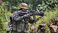 Indian Army personnel with a Mod. Ak rifle