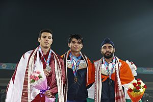 Neeraj Chopra Of India(Gold) , Ahmed B A Of Qatar(Silver) And Davinder Singh Of India(Bronze)