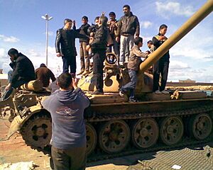 People on a tank in Benghazi1