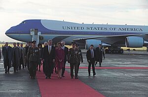 President Bill Clinton arrives at Dublin and proceeds on the tarmac with President Mary Robinson and Prime Minister John Bruton