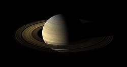 Saturn, its rings, and a few of its moons