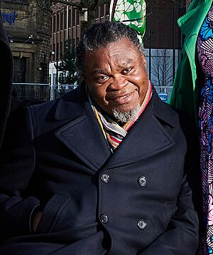 Yinka Shonibare CBE RA, in front of Hibiscus Rising. LEEDS 2023 (cropped).jpg